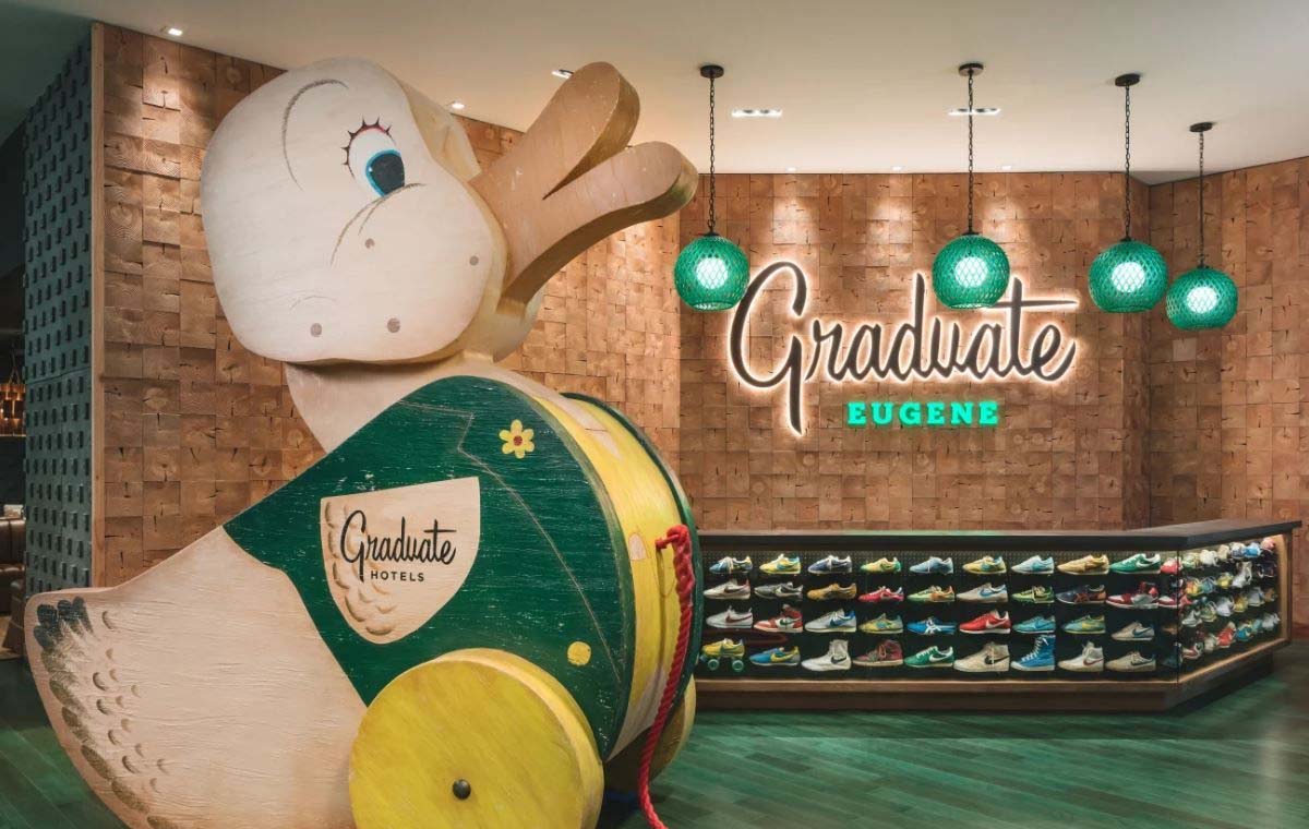 A giant wooden toy duck greets guests at The Graduate Hotel in Eugene as an example of an experiential hotel