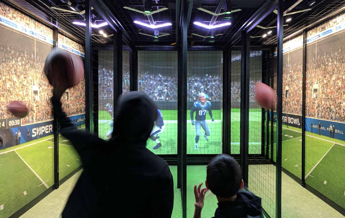 The NFL Fan Experience quarterback challenge interactive in Times Square