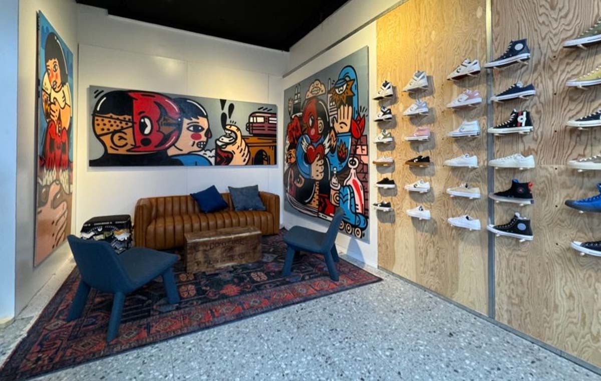 Converse elevates the retail customer experience by integrating local art into their pop ups.